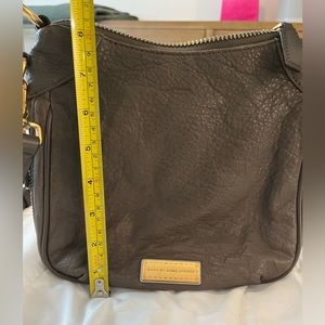 Marc Jacobs messenger handbag.